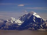 Tibet Kailash 12 Flying From Kathmandu 05 Manaslu  and Peak 29 Peak 29 (7871m, also called Ngadi Chuli) is in the right foreground and just behind, separated by clouds, is Manaslu (8163m), the eight highest mountain in the world.